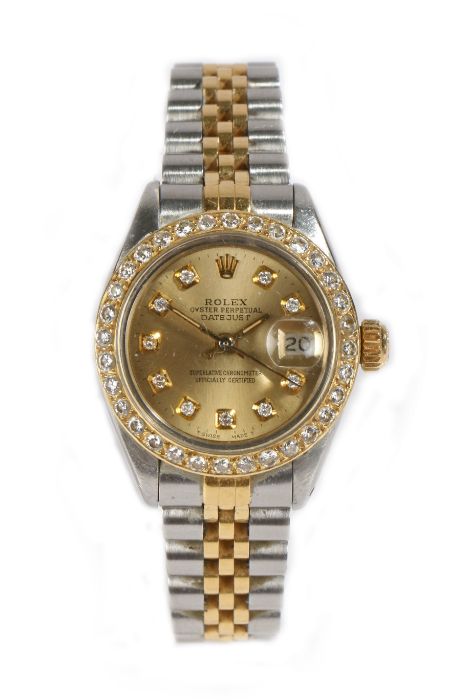 A lady's Rolex Datejust bi-metal and diamond wristwatch, the signed gilt dial with diamond