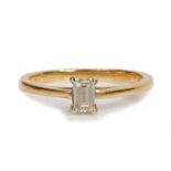 A baguette diamond solitaire ring, set with four claws, 2.2 grams, ring size K