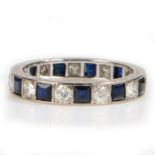 A Sapphire and Diamond set eternity ring, with interspersed sapphires and diamonds to the shank, 3.4