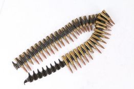 Belt of Graf 6.5 Carcano shell cases and projectiles, inert