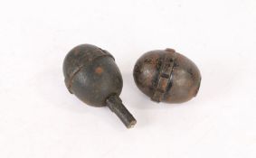 Two First World War German Model 17 Eierhandgranate ('egg grenade') , one fitted with an ignition