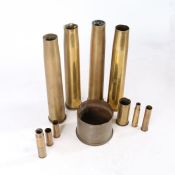 Assorted brass shell cases including 4 x 40 mm shell cases, German 110mm dated 1915, 30mm, 20mm,