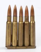 Second World War charger clip of five 30-06 rounds, dated 1941 to base, inert