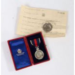 Edward VII 1902 Coronation Medal in silver, the reverse engraved 'Captain W. Houghton, The Kings