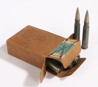 Second World War German box of fifteen 7.92mm steel cased rifle rounds, base of cases and original