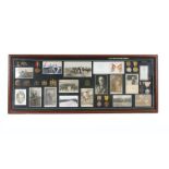 Framed First World War display including two pairs 1914-1918 British War Medal and Victory Medals (