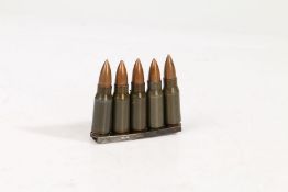 Post Second World War East German charger clip of five 7.92 Kurz rounds, used for the Stg 43 Assault