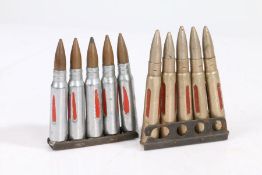 A 5 round charger clips of 7.62 Drill/Training ammunition, together with a 5 round charger clip