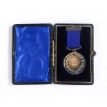 Silver Medal to the 2nd Norfolk Artillery Volunteers, obverse has four artillerymen standing by a