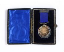 Silver Medal to the 2nd Norfolk Artillery Volunteers, obverse has four artillerymen standing by a