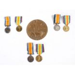 First World War family grouping of medals to three brothers, 1914-1918 British War Medal and Victory