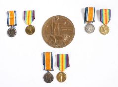 First World War family grouping of medals to three brothers, 1914-1918 British War Medal and Victory