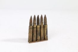 First World War German charger clip of ten 7.92mm rounds, inert