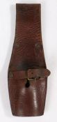 Late 19th, early 20th century British brown leather universal pattern bayonet frog, hole in the