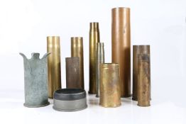 Assorted large calibre shell cases including German 77mm dated 1916, German 105mm dated 1917,