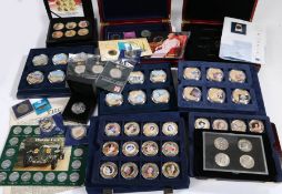 A collection of commemorative coins and medallions, to include the great British heroes golden crown
