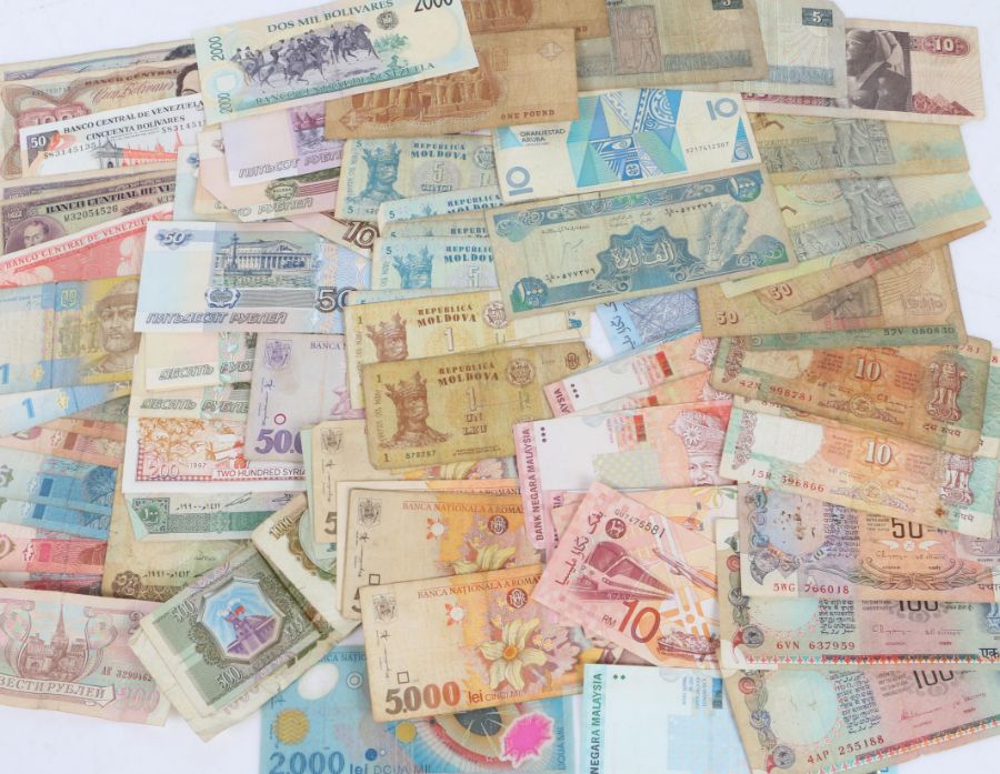 A Collection of world banknotes, sorted into envelopes, to include Ukraine, Syria, Venezuela,