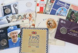 A collection of Royal Mint and other uncirculated coin sets, to include the royal birth 2015 £5, the