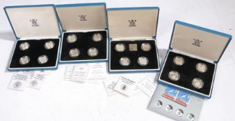 Royal Mint, Silver proof one pound four coin set, four sets in total, 1980's, 1990s, 2000's, (4)