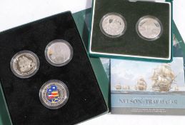 The Royal Mint battle of Trafalgar silver proof collection, containing three silver £5 coins,