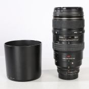 Nikon AF VR Zoom-NIKKOR 80-400mm f/4.5-5.6D lens with soft case and instruction manual.
