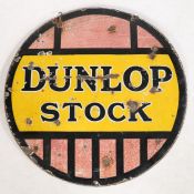 Dunlop Stock circular double sided enamel sign, 61cm diameter.