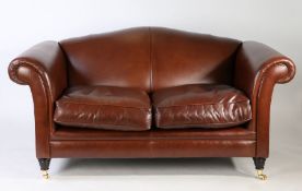 Laura Ashley Gloucester brown leather two seater sofa in good condition. Castors to the front