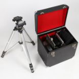 A 5x4 large format camera with case, accessories, and stand.