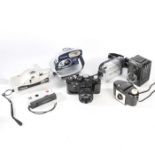 A collection of cameras to include a Zenit TTL, Lubitel 2, JVC GR-D23EK digital video camera with