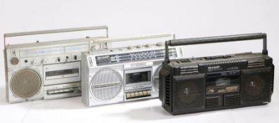 Three portable radio/ cassette players, Sharp WQ-T34 double cassette, Sharp GF-4343, Brandt