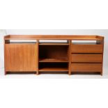 A mid Century teak sectional sideboard with matching bedside drawers. 184cm wide x 68cm high x