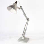 A silver anglepoise style lamp, 78cm tall when fully extended.