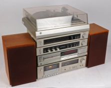 Technics SL-P222A CD player, together with a Rotel RD-820 cassette tape deck, a Rotel RT-820