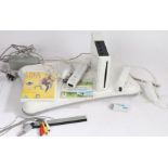 Nintendo Wii console with balance board, two controllers, Wii sports, Your Shape, Super Mario bros