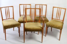 A set of five Gordon Russell upholstered dining chairs (one carver and four singles).