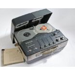 A Bang & Olufsen Beocord 2000 portable reel to reel player. Serial number: 24217.