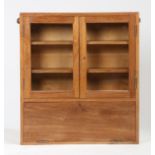 A mid Century teak hanging wall cabinet. 76cm high x 69cm wide x 14cm deep.