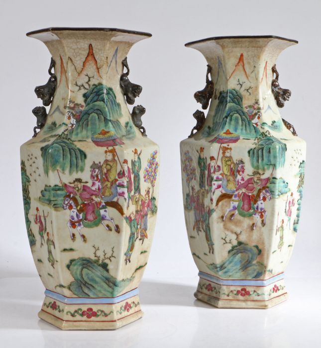 Pair of Chinese familie rose porcelain vases, the flared lips above crackle glaze to the neck and