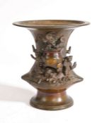 Chinese bronze vase, the flared lip above figures around a large vase and blooming flowers, 15cm