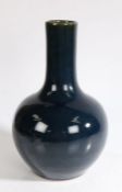 Chinese monochrome porcelain vase, the large blue vase with a green lip and bulbous body, 34cm high