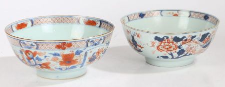 Two Chinese porcelain bowls, Qing Dynasty, in the Imari taste, 22.5cm wide with restoration, 24cm