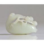 A Chinese jade carving, Qing Dynasty, 18th/19th Century, carved as a crane with its head turned to