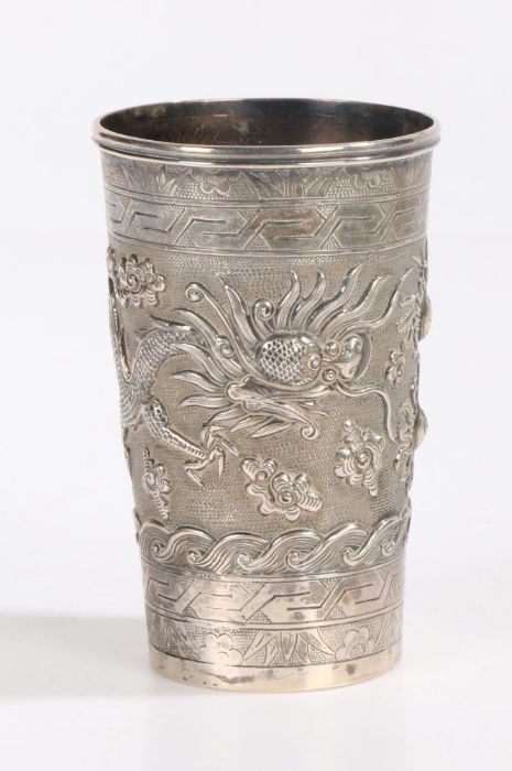 A 19th Century Chinese export silver beaker, the tapering body decorated in relief with a dragon - Image 5 of 8