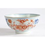A Chinese porcelain bowl, Qing Dynasty, 18th Century, with blue and red foliate decoration, 15cm