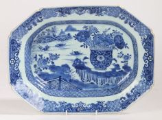 A Chinese porcelain export serving platter, the deep sunken centre with a boating scene and