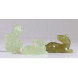 Chinese jade, three pieces of 20th Century jade, consisting of a reclining horse, 5.6cm long, a