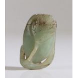A jade carving, Qing Dynasty, Tung Chih (1862-1875) carved as a leaf of pale green jade, 5cm long UK