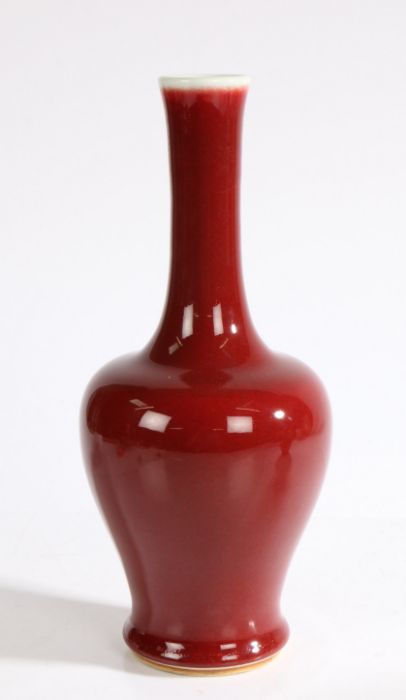 A Chinese copper red porcelain vase, 20th Century, with a celadon lip above a copper red body, six - Image 3 of 6