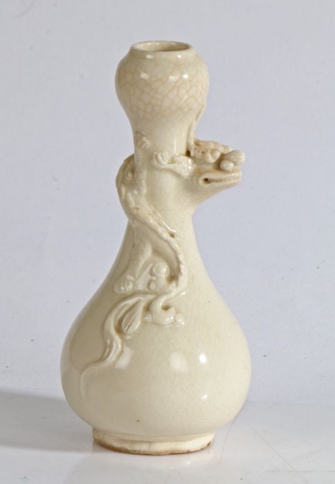Chinese bottle vase, with coiled dragon to the stem, onion lip and bulbous body, 12cm high
