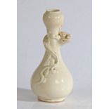 Chinese bottle vase, with coiled dragon to the stem, onion lip and bulbous body, 12cm high